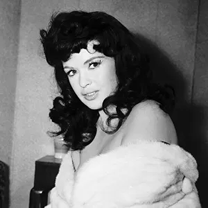 Actress and sex symbol Jayne Mansfield wearing brunette wig