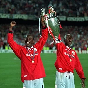 Andy Cole and Dwight Yorke Manchester United players with trophy after