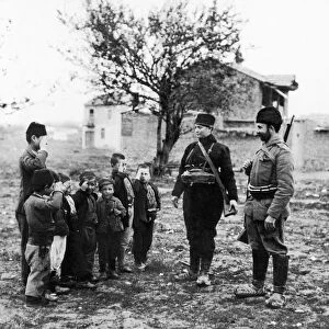 Balkans War November 1912 Turkish children salute Serbian soldiers