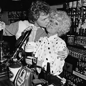 Barbara Windsor and her boyfriend Steve Hollings celebrate in their new pub