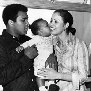 Boxer Mohammad Ali with his wife Veronica and 1 year old baby Hanna leaving Heathrow