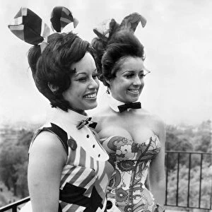 Bunny Girls at Playboy. One woman wears a basque, the other wears a dress; plus bow ties