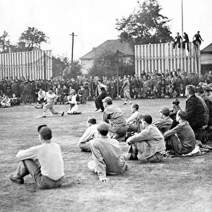 Canadian army v Us Army air force take part in a game of baseball at the Hounslow Cricket