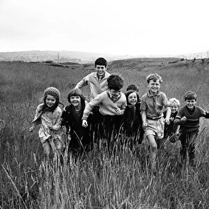 Children playing in the Lower Swansea Valley Project, Wales