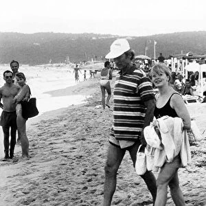 Clint Eastwood Actor with his Co-Actress Francis Fisher on the Beach