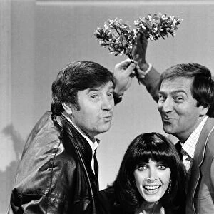 Des O Connor plays genial host to his guests Jimmy Tarbuck and Mart Caine