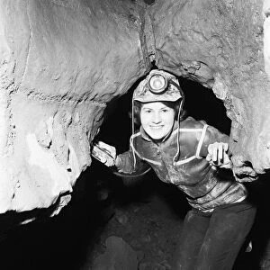 Eillen Davies seen here making her way thorough a series of caves under the Brecon