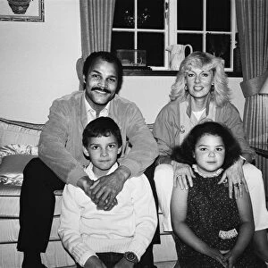 Ex-World Boxing Champion John Conteh at home with wife Veronica and two children