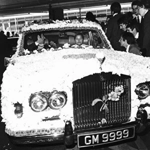 Guru Maharishi 15 in flower covered Rolls Royce in 1973 The Divine Light on a visit
