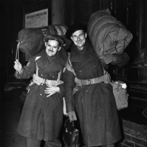 Two heavily laden soldiers of the British Army, Sergeants Lester (left) and Jarvis