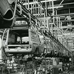 Hillman Imp cars and vans on production line hanging from cradles at Rootes car factory