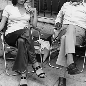 Joan Collins and Roger Moore during filming of The Persuaders TV series - June 1970
