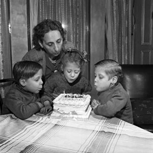 Leete Triplets celebrating their 6th Birthday - Alfred, Francis, Paul. January 1953 D326