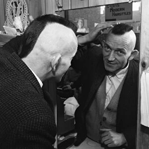 A man having a Mohican haircut in Middlesbrough. Circa 1971