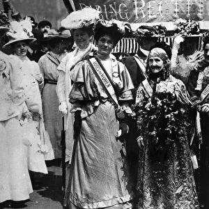 Mrs Pankhurst and Mrs Wolstanhokme Elmy the oldest suffragette at the at the Euston