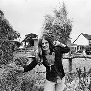 Ozzy Osbourne of Black Sabbath farming at his staffordshire home. 28th July, 1976