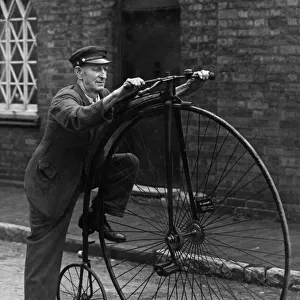 Peddler Palmer with his penny farthing bicycle still in perfect running order after 55