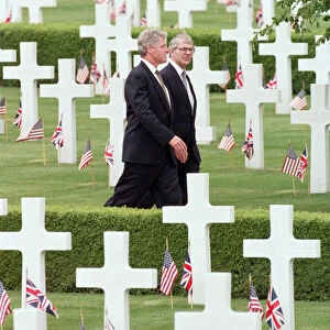 Prime Minister John Major, and US President Bill Clinton walking through the American