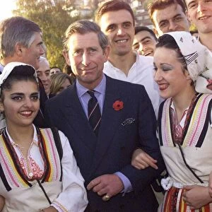 Prince Charles the Prince of Wales is pictured as he meets dancing girls in Ohrid in