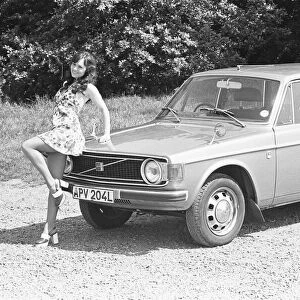 Reveille model seen here posing with a Volvo estate car first prize in a Reveille car