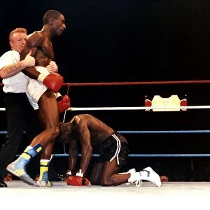 Rod Douglas is knocked down during a fight against Errol Graham at Wembley in 1989