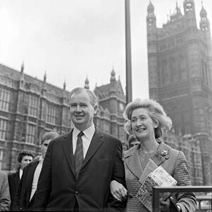 Scottish Nationalist MP Winnie Ewing stands outside the House of Commons with one of her