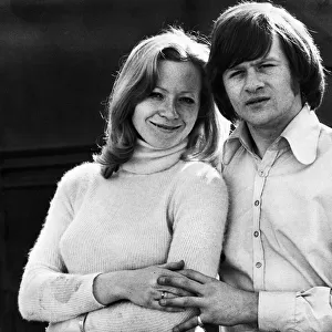 Snooker player Alex Higgins poses with his girfriend Elizabeth Kendall in 1973