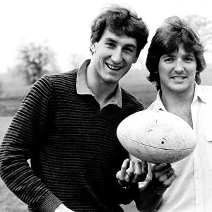 Terry Butcher and Russell Osman of Ipswich March 1981 holding rugby ball