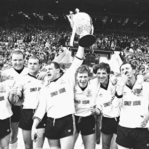The Widnes team celebrate after their 19 - 6 victory over Wigan in the Rugby League Cup