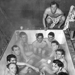 Yeovil Town football players enjoy a team bath as they celebrate winning FA Cup match