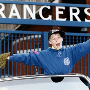 Young Colin Wilson can t believe it as he proudly shows off his bits of Ibrox turf