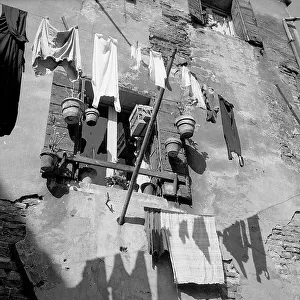 Laundry hung from a window, Venice